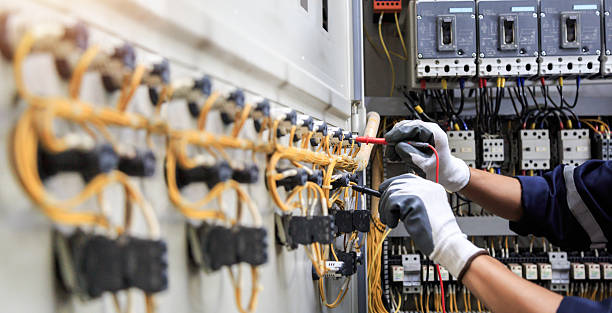 Professional Electrician technician working in Bay Harbor Islands, FL